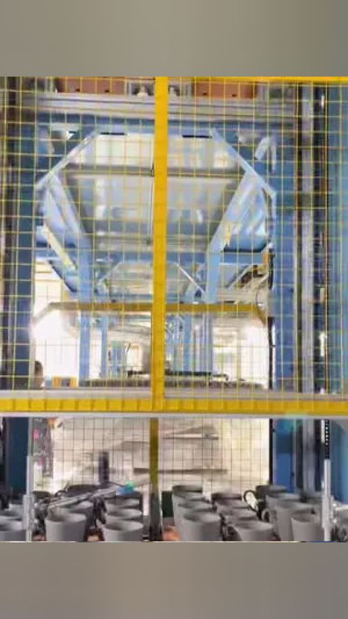完成接把后產品坐上小電梯進入烘干階段 源頭實力廠家 自動化生產線